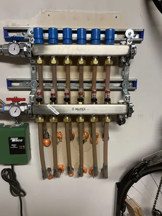 Plumber performing Gas Line Installation at a residential property in Greensburg